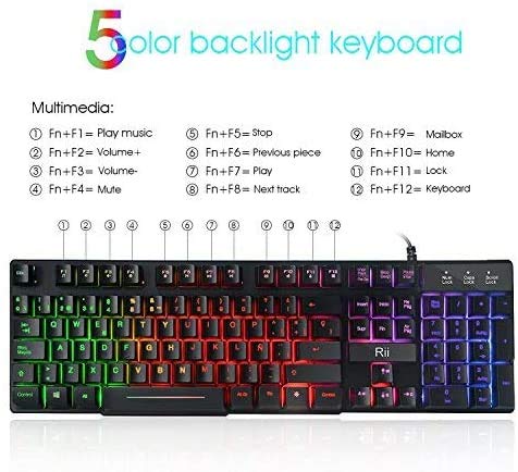 Rii RK100+ Novedoso Teclado USB Retroiluminado,Colores Rainbow y Panel metálico Resistente,Alta sensibilidad Ideal para Jugar, QWERTY con Layout Español Teclado espandido.