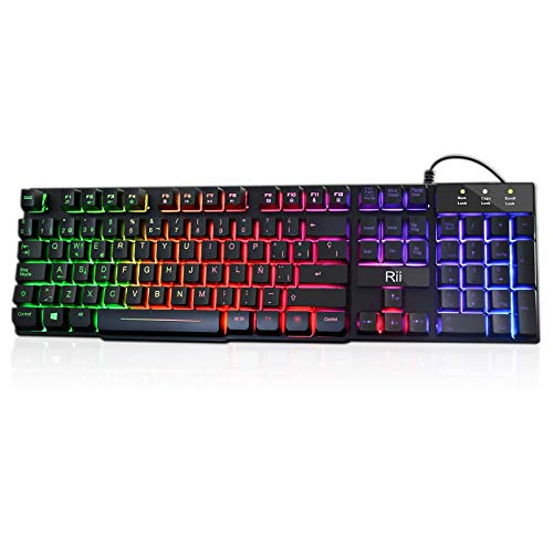 Rii RK100+ Novedoso Teclado USB Retroiluminado,Colores Rainbow y Panel metálico Resistente,Alta sensibilidad Ideal para Jugar, QWERTY con Layout Español Teclado espandido.