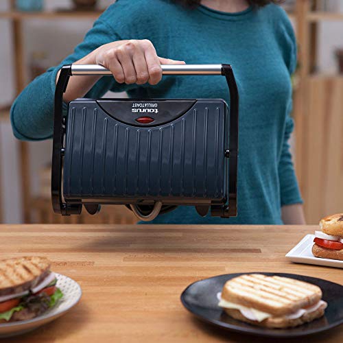 Taurus 968419000 Grill & Toast - Sandwichera con placas grill antiadherentes, 700 W, tapa basculante, gancho fijo de cierre, bandeja recoge grasas, color negro