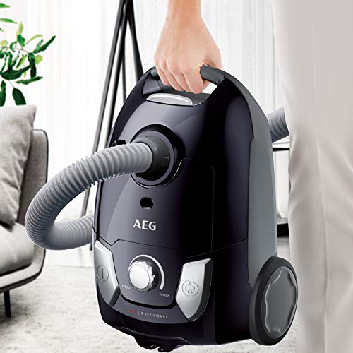 AEG VX4-1-EB Aspiradora de Trineo Con Bolsa, 750W de Potencia, Indicador de Llenado, Radio de acción de 7.5m, Capacidad para 3,5 litros, 79dB de Ruido, Cepillos Suelos Duros y Parquet, Negro, Clase A