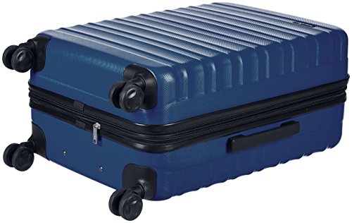 Amazon Basics - Maleta de viaje rígidaa giratoria - 68 cm, Azul marino