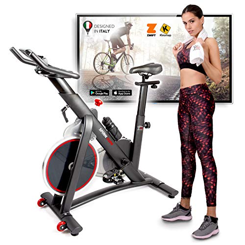 Spinning Bike YM Spinn 2000 - Bicicleta de spinning para casa, resistencia magnética para un pedal flotante, pantalla LCD, Bluetooth + aplicación ZWIFT y KINOMAP, sillín y manillar ajustables