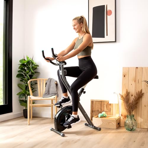 Cecotec Bicicleta estática plegable DrumFit X-Bike Neo, Sillín y manillar lateral, Sistema de plegado fácil y compacto, Soporte para dispositivos, 8 niveles de resistencia, 1,5 Kg volante de inercia.