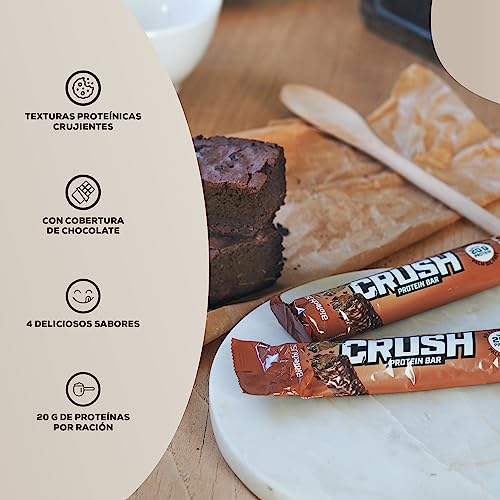 BioTechUSA Crush Bar Barrita alta en proteínas con cobertura de chocolate crujiente y sin azúcar añadido, 12 * 64 g, Chocolate-Brownie