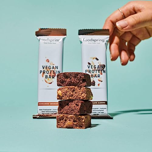 foodspring Barrita Proteica Vegana, 12 x 60g, Chocolate y Almendras, tu snack proteico vegano con proteína 100% vegetal